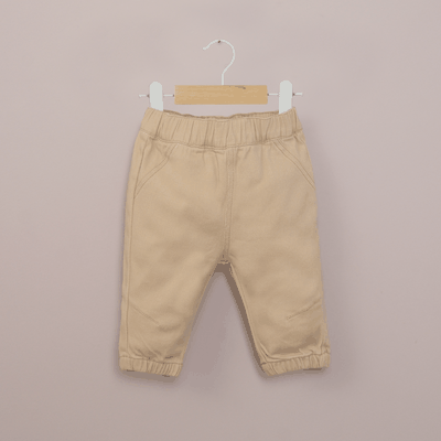 Pantalón beige de bebé niño