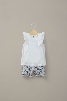 Conjunto calza y polera blanca de niña