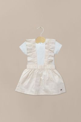 Conjunto beige de bebé niña