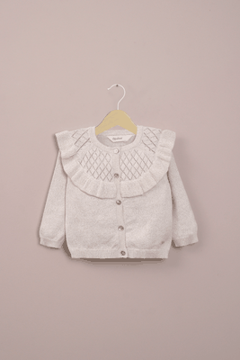 Chaleco blanco con lurex de niña