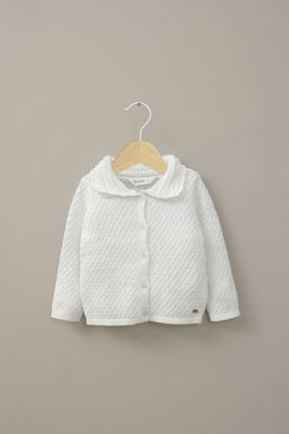 Chaleco crema de niña