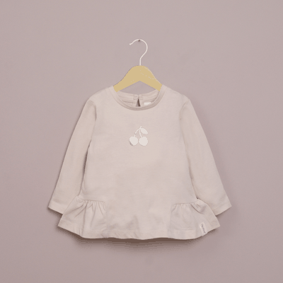 Polera manga larga crema de niña