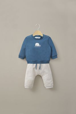 Conjunto buzo beige de bebé niño