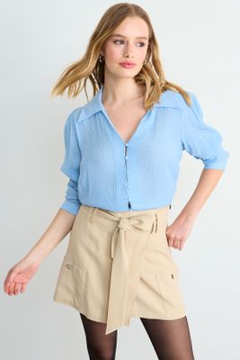 Imagen 1 del producto Blusa Lisa Celeste iO 14020126008110