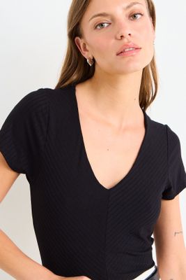 Imagen 1 del producto Polera Manga Corta Lisa Negro iO 14204225104102