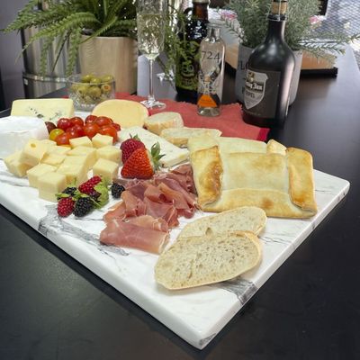 Imagen 2 del producto TABLA EXHIBICIÓN MELAMINA RECTANGULAR MÁRMOL BLANCO 53X32X1 CM