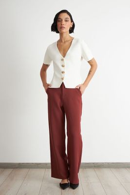 Imagen 2 del producto Polera Hilo Cuello V Botones Blanco Nicopoly