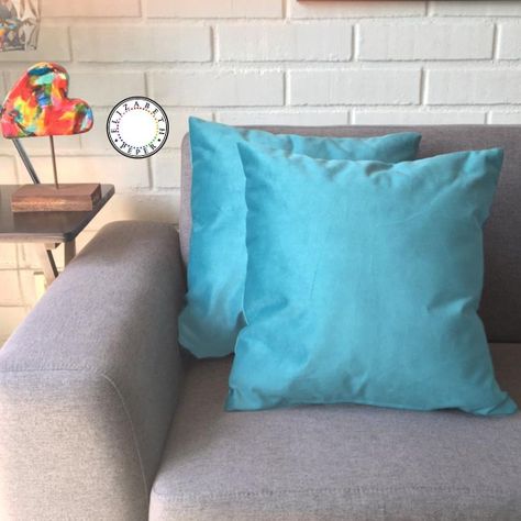COJIN DECORATIVO DISEÑO TURQUESA SUAVE 60x60 RELLENO-1