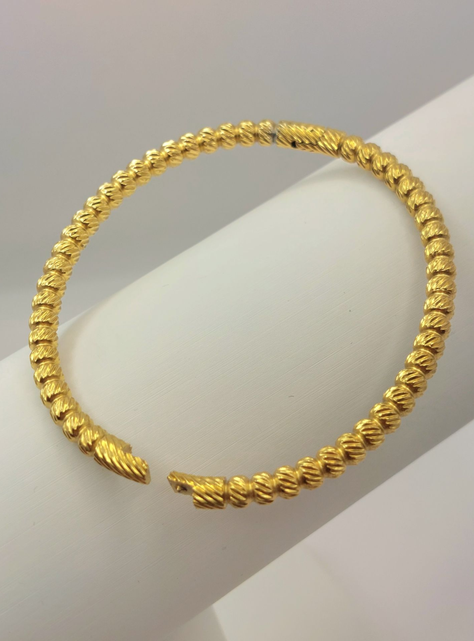 Brazalete Rígido Esferas de Oro Diamantadas con Cierre Click Oro Laminada 18k-2