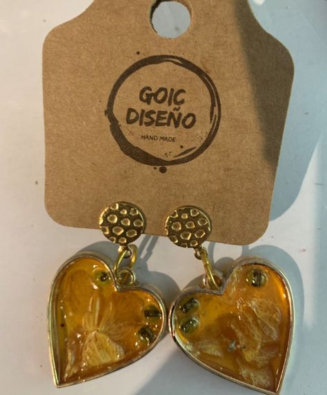aros de resina con borde de metal y flores-0