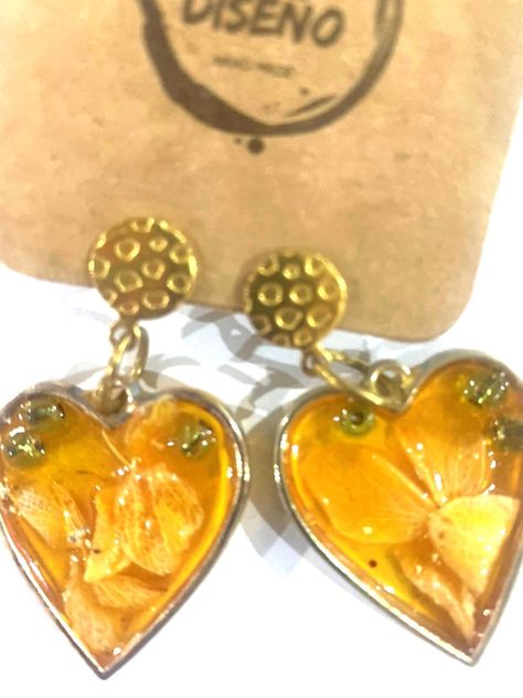 aros de resina con borde de metal y flores-1