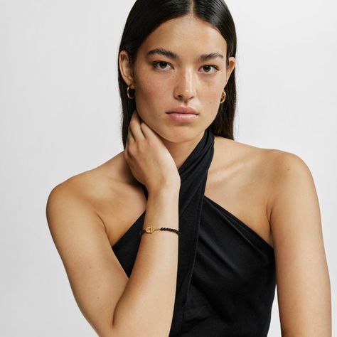 Pulsera con baño de oro 18 kt sobre plata y ónix Manifesto-4