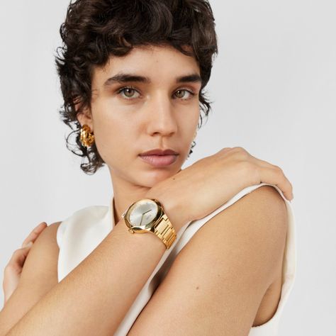 Reloj analógico con brazalete de acero dorado Karat Round-5