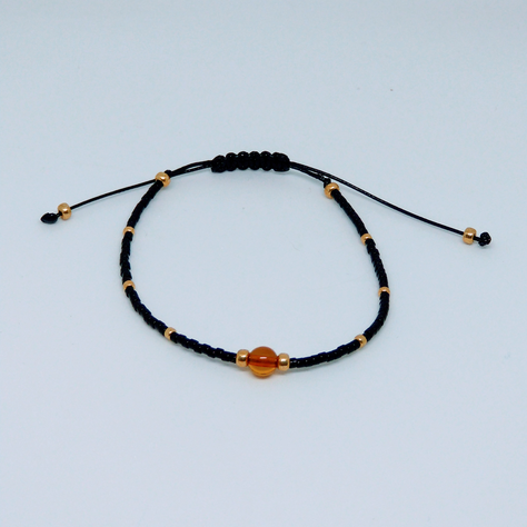 Pulsera negra contra el mal de ojo (delicas negras y bañadas en oro)-0