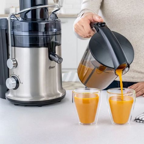 Extractor de jugos Oster® boca ancha FPSTJE320S-4