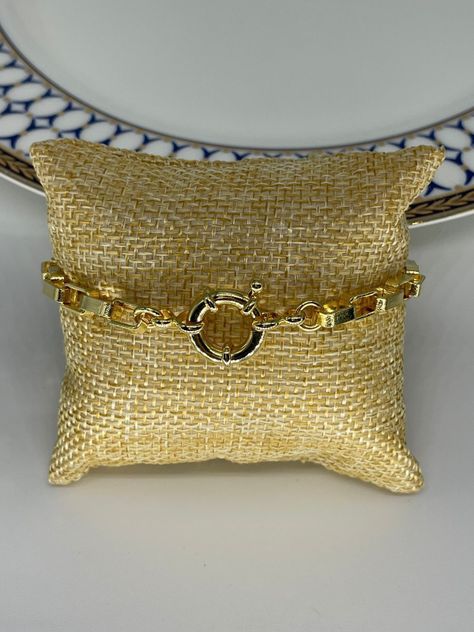 Pulsera cadenetas y timón enchapada en oro de 18k-1