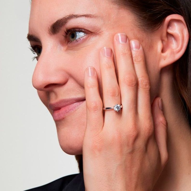 ANILLO DE COMPROMISO CON BRILLANTE SOLITARIO DE 2.-1