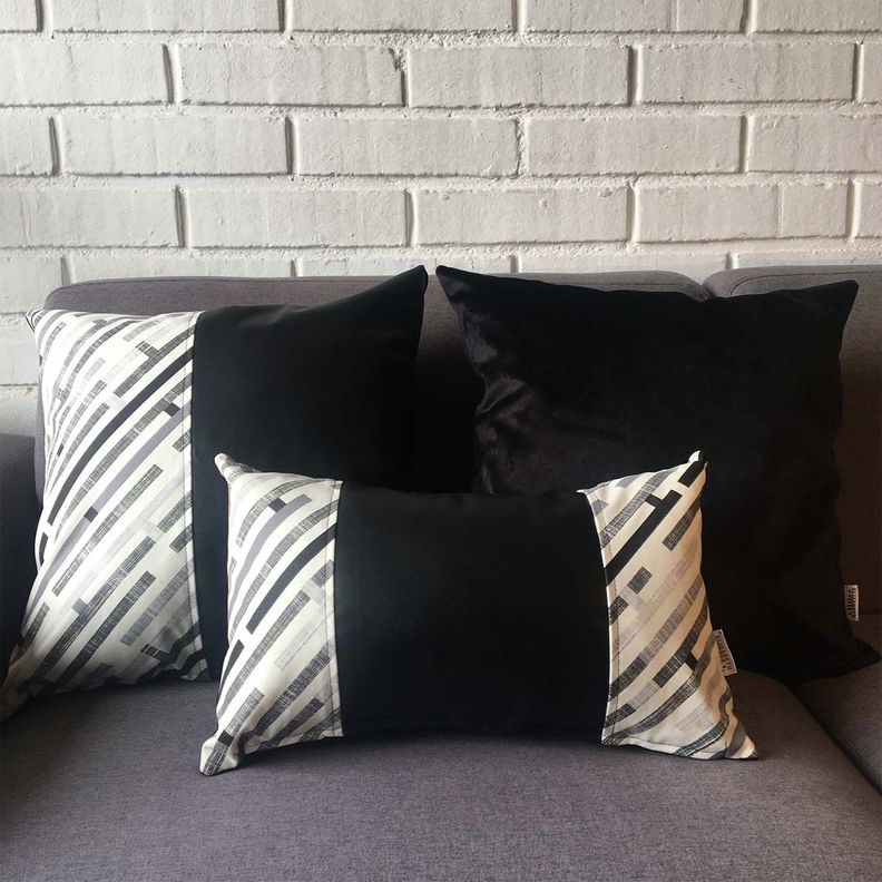 COJIN DECORATIVO ECOCUERO GRIS Y NEGRO 50X30 RELLENO-1