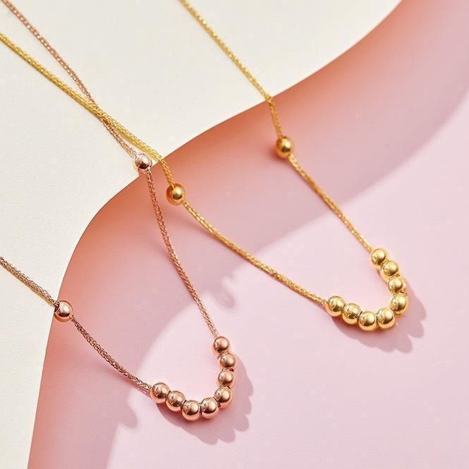 CADENA TEJIDA ORO AMARILLO 18K COLGANTE 12 PELOTITAS 18K-1