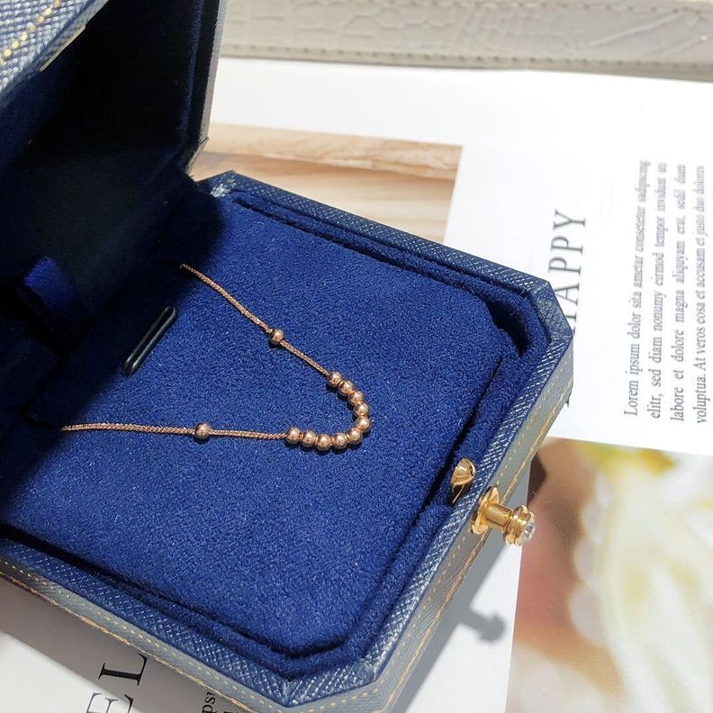 CADENA TEJIDA ORO ROSADO 18K COLGANTE 12 PELOTITAS 18K-1