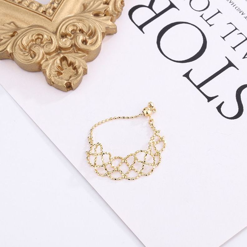 ANILLO ORO AMARILLO 18K PELOTITAS DISEÑO AJUSTABLE-1
