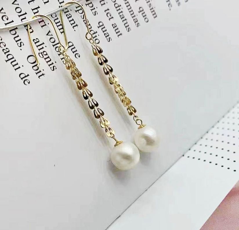 AROS LARGOS COLA DE FÉNIX PERLA DE RIO ORO AMARILLO 18K-1