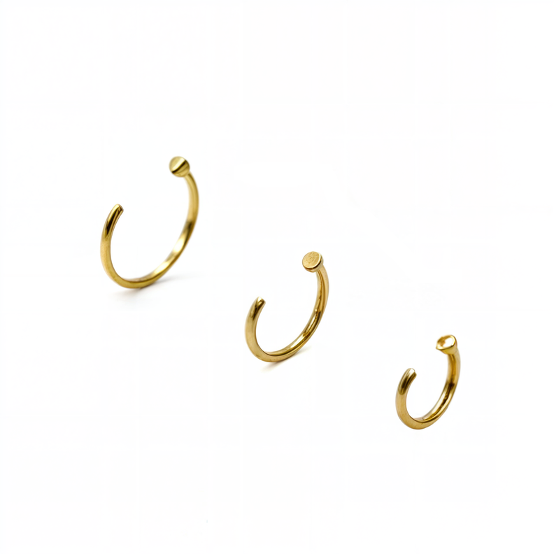 Pack de tres aros piercing abierto nostril titanio ASTM F136 dorados-0
