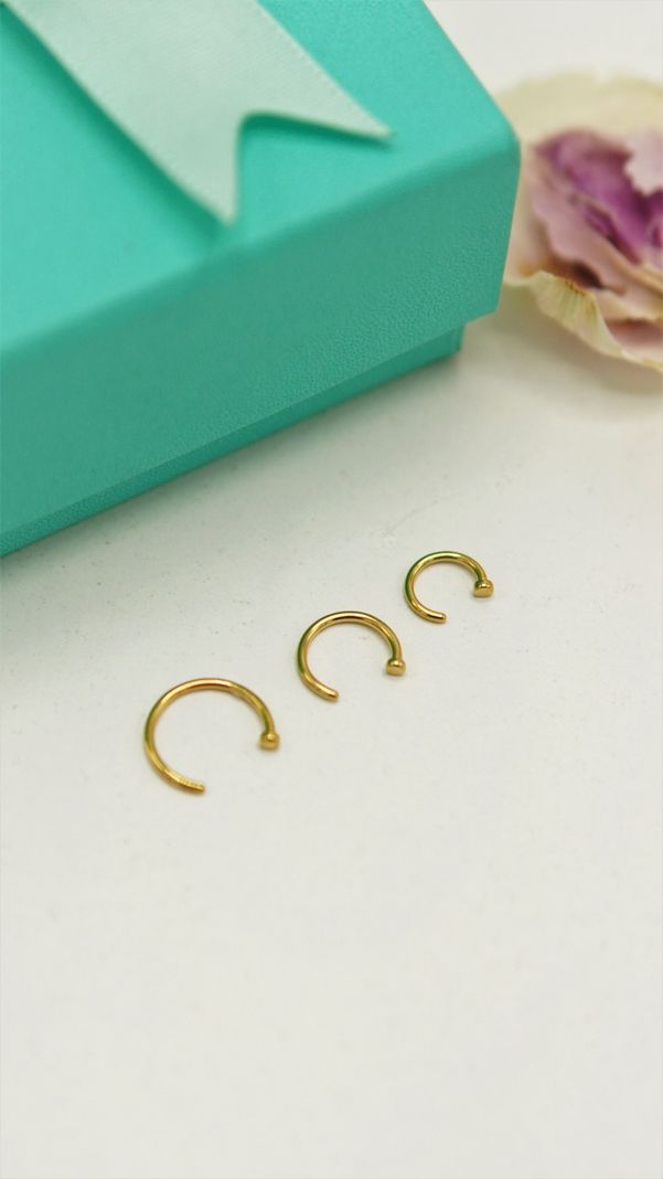 Pack de tres aros piercing abierto nostril titanio ASTM F136 dorados-1