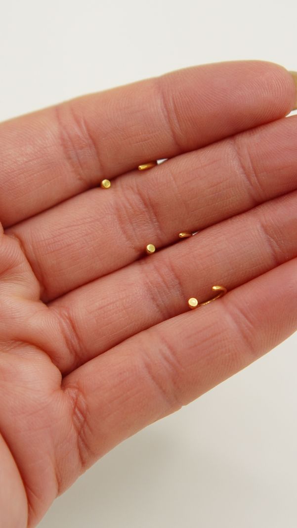 Pack de tres aros piercing abierto nostril titanio ASTM F136 dorados-5