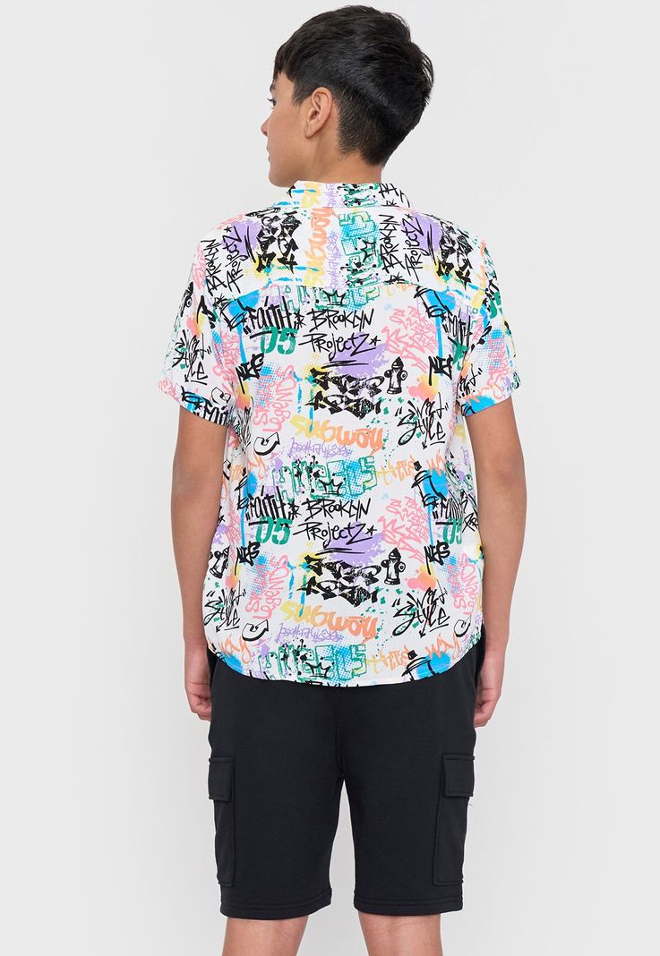 Camisa Niño Viscosa Fullprint Graffiti Blanco Corona-2