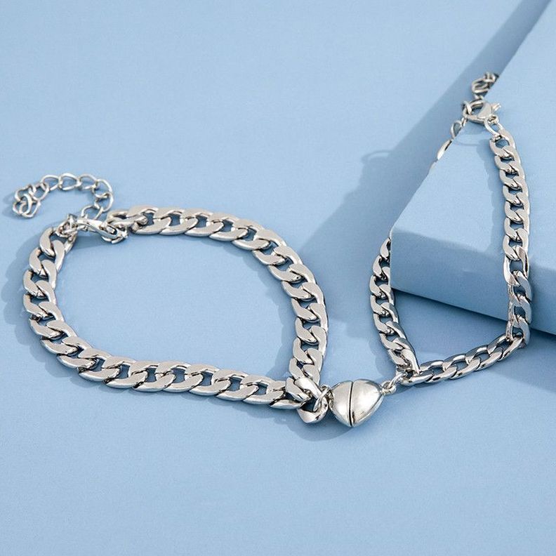 Duo Pulseras Cadena Cubana con Corazón Magnético – Acero-1