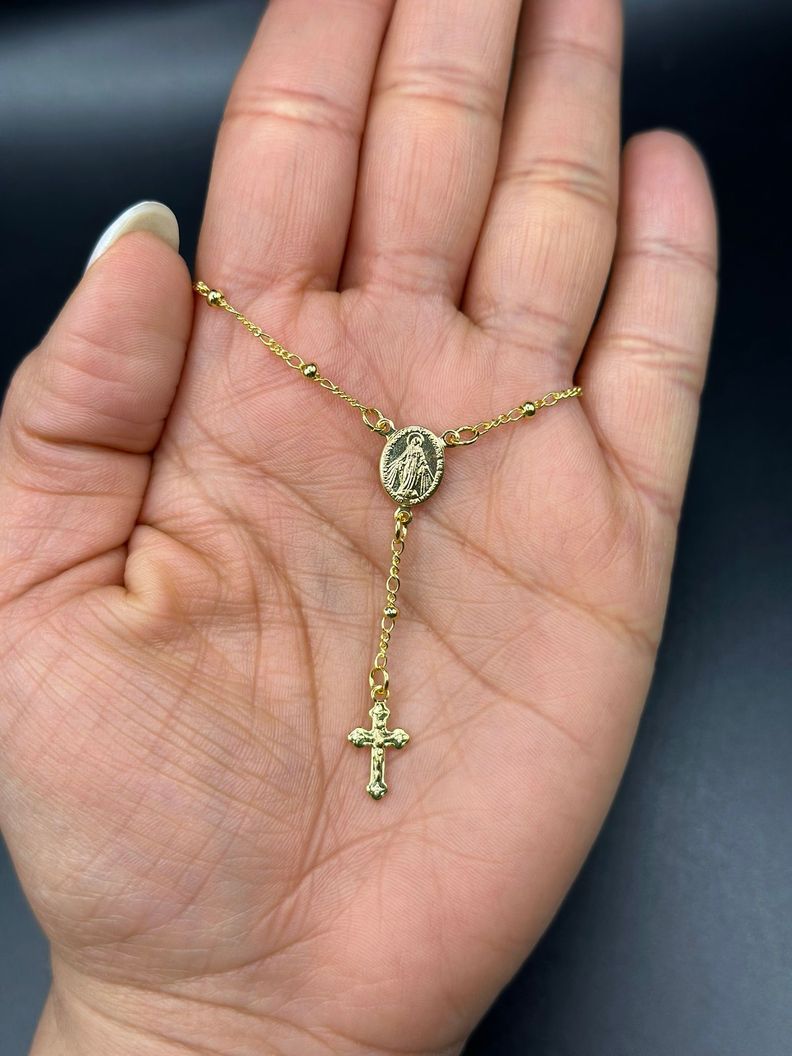 Pulsera Denario Cruz Baño En Oro-1