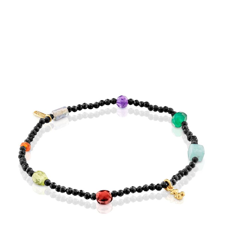 Pulsera elástica con baño de oro 18 kt sobre plata y onix-0