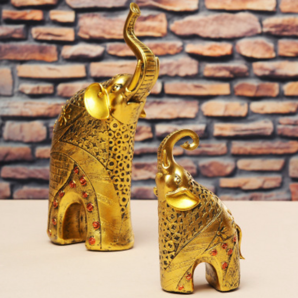 Set de elefantes decorativos tonos dorados-1