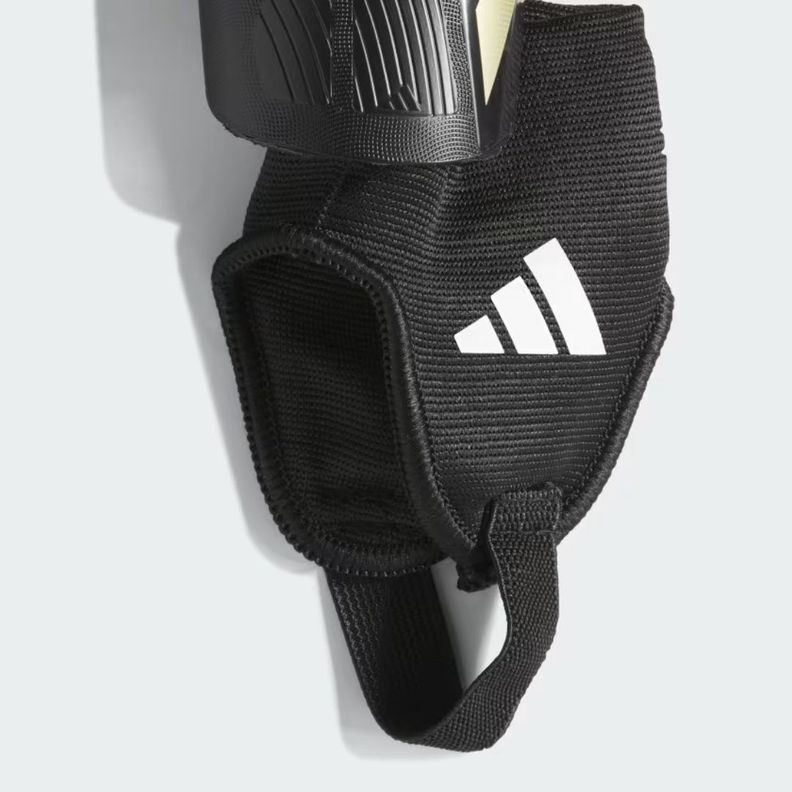 CANILLERAS ADIDAS TIRO MATCH PARA NIÑOS NEGRO/DORADO | IP39-1