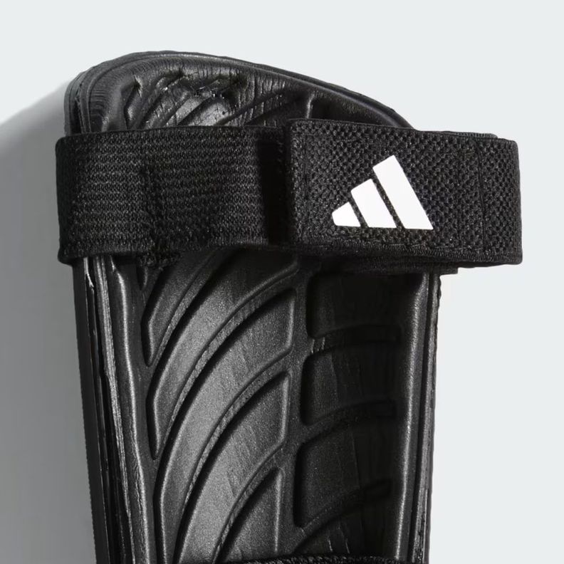 CANILLERAS ADIDAS TIRO MATCH PARA NIÑOS NEGRO/DORADO | IP39-2