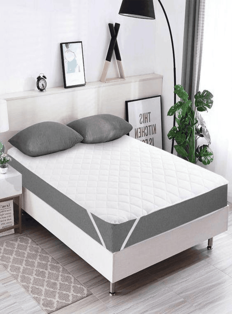 Cubrecolchon en Cobre y Polar, es reversible y absorbente tamaño 2 plazas.-0